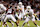 COLLEGE STATION, TEXAS - NOVEMBER 30: Arch Manning #16 of the Texas Longhorns takes a snap in the first half against the Texas A&M Aggies at Kyle Field on November 30, 2024 in College Station, Texas. (Photo by Tim Warner/Getty Images)