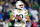 SEATTLE, WASHINGTON - DECEMBER 15: Jordan Love #10 of the Green Bay Packers looks to pass against the Seattle Seahawks during the first half of the game at Lumen Field on December 15, 2024 in Seattle, Washington. (Photo by Steph Chambers/Getty Images)