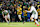 CARY, NC - DECEMBER 16: Vermont forward Yaniv Bazini (11) brings the ball up the field during the NCAA Championship soccer match between the Marshall Thundering Herd and the Vermont Catamounts on December 16, 2024 at WakeMed Soccer Park in Cary, NC. (Photo by Nicholas Faulkner/Icon Sportswire via Getty Images)