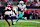 HOUSTON, TX - DECEMBER 15: Grant DuBose #88 of the Miami Dolphins runs with the ball against the Houston Texans during the first half of an NFL football game at NRG Stadium on December 15, 2024 in Houston, Texas. (Photo by Cooper Neill/Getty Images)