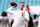 MIAMI GARDENS, FLORIDA - AUGUST 17: Mike White #14 of the Miami Dolphins warms up prior to a preseason game against the Washington Commanders at Hard Rock Stadium on August 17, 2024 in Miami Gardens, Florida. (Photo by Megan Briggs/Getty Images)