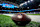 DETROIT, MICHIGAN - DECEMBER 15: A general view of a Wilson brand NFL football with the logos on the field before the game between the Detroit Lions and Buffalo Bills at Ford Field on December 15, 2024 in Detroit, Michigan. (Photo by Nic Antaya/Getty Images)
