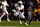 LOS ANGELES, CALIFORNIA - NOVEMBER 30: Jadarian Price #24 of the Notre Dame Fighting Irish runs with the ball during the second half against USC Trojans at United Airlines Field at the Los Angeles Memorial Coliseum on November 30, 2024 in Los Angeles, California. (Photo by Ric Tapia/Getty Images)