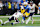 INGLEWOOD, CALIFORNIA - DECEMBER 19: Gus Edwards #4 of the Los Angeles Chargers runs the ball against P.J. Locke #6 of the Denver Broncos during the fourth quarter in the game at SoFi Stadium on December 19, 2024 in Inglewood, California. (Photo by Sean M. Haffey/Getty Images)