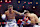 RIYADH, SAUDI ARABIA - DECEMBER 21: Lee McGregor punches Isaac Lowe during the WBC International Featherweight title fight between Isaac Lowe and Lee McGregor as part of Oleksandr Usyk v Tyson Fury 2, Reignited card at Kingdom Arena on December 21, 2024 in Riyadh, Saudi Arabia. (Photo by Richard Pelham/Getty Images)