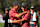 ORLANDO, FLORIDA - DECEMBER 22: Tiger Woods of the United States reacts with his son Charlie Woods after making the first hole-in-one of his career on the fourth hole during the second round of the PNC Championship at Ritz-Carlton Golf Club on December 22, 2024 in Orlando, Florida. (Photo by Mike Ehrmann/Getty Images)