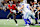 ARLINGTON, TEXAS - DECEMBER 22: Baker Mayfield #6 of the Tampa Bay Buccaneers scrambles under pressure from the Dallas Cowboys during the third quarter at AT&T Stadium on December 22, 2024 in Arlington, Texas. (Photo by Ron Jenkins/Getty Images)