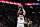 MINNEAPOLIS, MN - DECEMBER 21: Jonathan Kuminga #00 of the Golden State Warriors shoots a free throw during the game against the Minnesota Timberwolves on December 21, 2024 at Target Center in Minneapolis, Minnesota. NOTE TO USER: User expressly acknowledges and agrees that, by downloading and or using this Photograph, user is consenting to the terms and conditions of the Getty Images License Agreement. Mandatory Copyright Notice: Copyright 2024 NBAE (Photo by Jordan Johnson/NBAE via Getty Images)