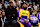 LOS ANGELES, CA - DECEMBER 8: LeBron James #23 and Bronny James #9 of the Los Angeles Lakers look on during the game against the Portland Trail Blazers on December 8, 2024 at Crypto.Com Arena in Los Angeles, California. NOTE TO USER: User expressly acknowledges and agrees that, by downloading and/or using this Photograph, user is consenting to the terms and conditions of the Getty Images License Agreement. Mandatory Copyright Notice: Copyright 2024 NBAE (Photo by Adam Pantozzi/NBAE via Getty Images)