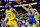 LAS VEGAS, NEVADA - OCTOBER 15: Stephen Curry #30 of the Golden State Warriors passes as LeBron James #23 of the Los Angeles Lakers defends in the first quarter of their preseason game at T-Mobile Arena at T-Mobile Arena on October 15, 2024 in Las Vegas, Nevada. The Warriors defeated the Lakers 111-97. NOTE TO USER: User expressly acknowledges and agrees that, by downloading and or using this photograph, User is consenting to the terms and conditions of the Getty Images License Agreement. (Photo by Ethan Miller/Getty Images)