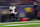 HOUSTON, TEXAS - DECEMBER 25: Lamar Jackson #8 of the Baltimore Ravens runs the ball for a touchdown during the third quarter against the Houston Texans at NRG Stadium on December 25, 2024 in Houston, Texas. (Photo by Tim Warner/Getty Images)