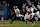 CHICAGO, ILLINOIS - DECEMBER 26: Wide receiver Jaxon Smith-Njigba #11 of the Seattle Seahawks runs the ball during the second half of an NFL game against the Chicago Bears at Soldier Field on December 26, 2024 in Chicago, Illinois. (Photo by Todd Rosenberg/Getty Images)