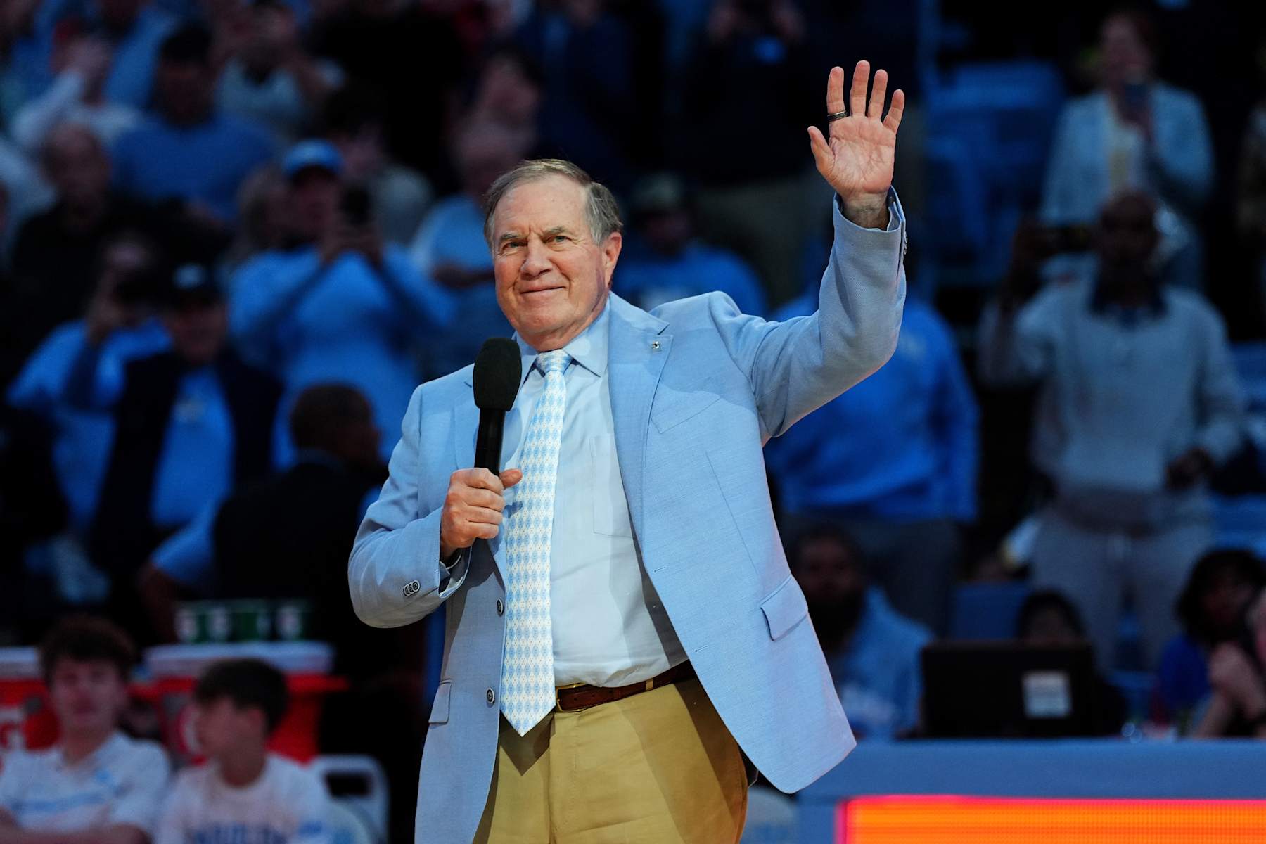 Football CHAPEL HILL, NORTH CAROLINA - DECEMBER 14: Head coach Bill Belichick of the North Carolina Tar Heels addresses the crowd during halftime in the game against the La Salle Explorers at the Dean E. Smith Center on December 14, 2024 in Greensboro, North Carolina. (Photo by Grant Halverson/Getty Images)