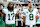 JACKSONVILLE, FLORIDA - DECEMBER 15: Davante Adams #17 of the New York Jets and Aaron Rodgers #8 look on from the sideline during the national anthem prior to an NFL football game against the Jacksonville Jaguars at EverBank Stadium on December 15, 2024 in Jacksonville, FL. (Photo by Perry Knotts/Getty Images)