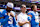 CHARLOTTE, NORTH CAROLINA - SEPTEMBER 15: Head coach Jim Harbaugh of the Los Angeles Chargers stands for the national anthem next to Derwin James Jr. #3 and Justin Herbert #10 before a game against the Carolina Panthers at Bank of America Stadium on September 15, 2024 in Charlotte, North Carolina. The Chargers defeated the Panthers 26-3. (Kara Durrette/Getty Images)