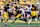 ANN ARBOR, MI - SEPTEMBER 02: Michigan Wolverines wide receiver Cornelius Johnson (6) runs with the ball after catching a pass while trying to avoid being tackled by East Carolina Pirates defensive back Shavon Revel (28) during the third quarter of a non-conference college football game between the East Carolina Pirates and the Michigan Wolverines on September 2, 2023 at Michigan Stadium in Ann Arbor, Michigan. (Photo by Scott W. Grau/Icon Sportswire via Getty Images)