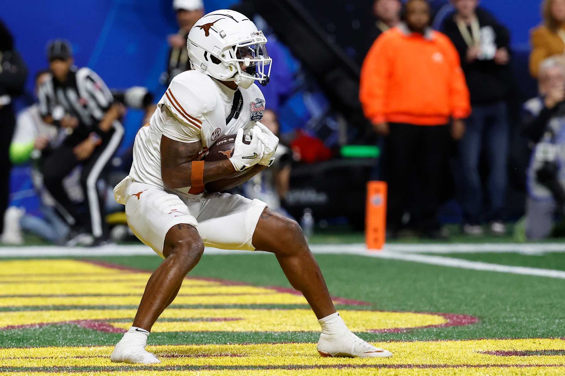 Football Football ATLANTA, GEORGIA - JANUARY 01: Matthew Golden #2 of the Texas Longhorns catches a pass for a touchdown during overtime against the Arizona State Sun Devils in the Chick-fil-A Peach Bowl at Mercedes-Benz Stadium on January 01, 2025 in Atlanta, Georgia. (Photo by Butch Dill/Getty Images)