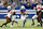 INDIANAPOLIS, IN - NOVEMBER 28: Indianapolis Colts Running Back Jonathan Taylor (28) runs through the hole during a NFL game between the Tampa Bay Buccaneers and the Indianapolis Colts on November 28, 2021, at Lucas Oil Stadium in Indianapolis, IN. (Photo by Jeffrey Brown/Icon Sportswire via Getty Images)