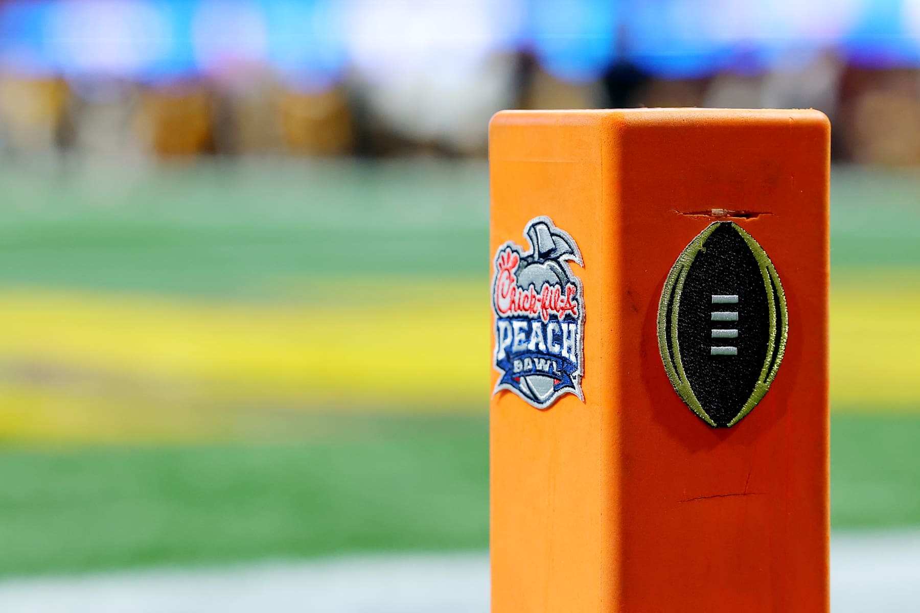 Football ATLANTA, GEORGIA - JANUARY 01: A view of the Chick-fil-A Peach Bowl logo on a pylon during the third quarter between the Texas Longhorns and Arizona State Sun Devils at Mercedes-Benz Stadium on January 01, 2025 in Atlanta, Georgia.  (Photo by Kevin C. Cox/Getty Images)