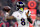 HOUSTON, TEXAS - DECEMBER 25: Lamar Jackson #8 of the Baltimore Ravens throws a pass in the second half against the Houston Texans at NRG Stadium on December 25, 2024 in Houston, Texas. (Photo by Tim Warner/Getty Images)