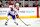 DETROIT, MICHIGAN - DECEMBER 20: Lane Hutson #48 of the Montreal Canadiens passes the puck against the Detroit Red Wings at Little Caesars Arena on December 20, 2024 in Detroit, Michigan. (Photo by Nic Antaya/Getty Images)