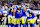 INGLEWOOD, CALIFORNIA - DECEMBER 28: Los Angeles Rams offensive unit group huddle during the first half against the Arizona Cardinals at SoFi Stadium on December 28, 2024 in Inglewood, California. (Photo by Ric Tapia/Getty Images)