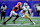 NEW ORLEANS, LOUISIANA - JANUARY 02: Riley Leonard #13 of the Notre Dame Fighting Irish carries the ball against Malaki Starks #24 of the Georgia Bulldogs during the third quarter during the 91st Allstate Sugar Bowl at Caesars Superdome on January 02, 2025 in New Orleans, Louisiana. (Photo by Sean Gardner/Getty Images)