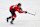 WASHINGTON, DC - JANUARY 04: John Carlson #74 of the Washington Capitals clears the puck against the New York Rangers during the first period at Capital One Arena on January 04, 2025 in Washington, DC. (Photo by Patrick Smith/Getty Images)