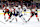 PHILADELPHIA, PENNSYLVANIA - JANUARY 07: Auston Matthews #34 of the Toronto Maple Leafs controls the puck against Tyson Foerster #71 and Bobby Brink #10 of the Philadelphia Flyers during the first period at the Wells Fargo Center on January 07, 2025 in Philadelphia, Pennsylvania. (Photo by Emilee Chinn/Getty Images)