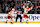 ANAHEIM, CALIFORNIA - JANUARY 07: Matt Coronato #27 congratulates Jonathan Huberdeau #10 of the Calgary Flames after his goal during overtime of a game against the Anaheim Ducks at Honda Center on January 07, 2025 in Anaheim, California. (Photo by Sean M. Haffey/Getty Images)
