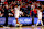 PISCATAWAY, NEW JERSEY - DECEMBER 30: Ace Bailey #4 and Dylan Harper #2 of the Rutgers Scarlet Knights react to the crowd during the second half of their game against the Columbia Lions at Jersey Mike's Arena on December 30, 2024 in Piscataway, New Jersey. (Photo by Ed Mulholland/Getty Images)