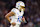 HOUSTON, TEXAS - JANUARY 11: Justin Herbert #10 of the Los Angeles Chargers reacts after throwing an interception against the Houston Texans in the third quarter during the AFC Wild Card Playoffs at NRG Stadium on January 11, 2025 in Houston, Texas. (Photo by Tim Warner/Getty Images)