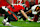 TAMPA, FLORIDA - JANUARY 12: Baker Mayfield #6 of the Tampa Bay Buccaneers fumbles against Bobby Wagner #54 of the Washington Commanders during the fourth quarter in the NFC Wild Card Playoff at Raymond James Stadium on January 12, 2025 in Tampa, Florida. (Photo by Mike Ehrmann/Getty Images)