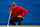 ORLANDO, FLORIDA - DECEMBER 22: Tiger Woods of the United States lines up a putt on the 18th green during a sudden-death playoff during the second round of the PNC Championship at Ritz-Carlton Golf Club on December 22, 2024 in Orlando, Florida. (Photo by Mike Ehrmann/Getty Images)