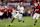 NORMAN, OKLAHOMA - NOVEMBER 23: Wide receiver Ryan Williams #2 of the Alabama Crimson Tide runs with a 19-yard catch for a 30-yard gain against cornerback Eli Bowen #23 of the Oklahoma Sooners in the first quarter at Gaylord Family Oklahoma Memorial Stadium on November 23, 2024 in Norman, Oklahoma. Oklahoma won 24-3. (Photo by Brian Bahr/Getty Images)