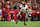 TAMPA, FLORIDA - JANUARY 12: Jayden Daniels #5 of the Washington Commanders scrambles out of the pocket during an NFL football wild card playoff game against the Tampa Bay Buccaneers at Raymond James Stadium on January 12, 2025 in Tampa, Florida. (Photo by Perry Knotts/Getty Images)