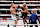 ARLINGTON, TEXAS - NOVEMBER 15: Mike Tyson (in black short) and Jake Paul (in silver short) exchange punches during their heavyweight world titles of the Premiere Boxing Championship on Friday night at AT&T Stadium in Arlington, Texas, United States on November 15, 2024. (Photo by Tayfun Coskun/Anadolu via Getty Images)