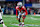 ARLINGTON, TX - JANUARY 10: Ohio State Buckeyes defensive end JT Tuimoloau (#44) lines up before the snap during the CFP Semifinal Cotton Bowl Classic football game between the Ohio State Buckeyes and Texas Longhorns on January 10, 2025 at AT&T Stadium in Arlington, TX. (Photo by Matthew Visinsky/Icon Sportswire via Getty Images)