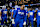 DETROIT, MICHIGAN - JANUARY 18: Penei Sewell #58 of the Detroit Lions reacts as he leads a huddle prior to an NFL Football game against the Washington Commanders at Ford Field on January 18, 2025 in Detroit, Michigan. (Photo by Michael Owens/Getty Images)
