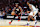 MIAMI, FLORIDA - JANUARY 19: Jimmy Butler #22 of the Miami Heat drives to the basket against the San Antonio Spurs during the first quarter of the game at Kaseya Center on January 19, 2025 in Miami, Florida. NOTE TO USER: User expressly acknowledges and agrees that, by downloading and or using this photograph, User is consenting to the terms and conditions of the Getty Images License Agreement. (Photo by Megan Briggs/Getty Images)