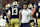 ATLANTA, GEORGIA - JANUARY 20: Riley Leonard #13 and head coach Marcus Freeman of the Notre Dame Fighting Irish celebrate after a first quarter touchdown against the Ohio State Buckeyes during the 2025 CFP National Championship at the Mercedes-Benz Stadium on January 20, 2025 in Atlanta, Georgia. (Photo by Jamie Squire/Getty Images)