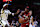 MIAMI, FLORIDA - NOVEMBER 26: Jimmy Butler #22 of the Miami Heat drives against Bobby Portis #9 of the Milwaukee Bucks during the third quarter of the Emirates NBA Cup at Kaseya Center on November 26, 2024 in Miami, Florida. NOTE TO USER: User expressly acknowledges and agrees that, by downloading and or using this photograph, User is consenting to the terms and conditions of the Getty Images License Agreement. (Photo by Megan Briggs/Getty Images)