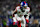 ARLINGTON, TX - NOVEMBER 28: Kayvon Thibodeaux #5 of the New York Giants defends against the Dallas Cowboys during an NFL football game at AT&T Stadium on November 28, 2024 in Arlington, Texas. (Photo by Cooper Neill/Getty Images)