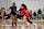 Aaliyah Chavez, right, dribbles around Midwest Elite defender Xyanna Walton, left, during a game at the Boo Williams Sports Complex on Friday, April 19, 2024, in Hampton, Va. (Photo by Mike Caudill/for The Washington Post via Getty Images)