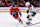 CHICAGO, IL - JANUARY 26: Ryan Donato #8 of the Chicago Blackhawks poke checks the puck from Marco Rossi #23 of the Minnesota Wild during the third period on January 26, 2025 at the United Center in Chicago, Illinois. (Photo by Melissa Tamez/Icon Sportswire via Getty Images)