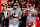 KANSAS CITY, MISSOURI - JANUARY 26: Patrick Mahomes #15 of the Kansas City Chiefs and Travis Kelce #87 celebrate on the podium following the AFC Championship Game against the Buffalo Bills at GEHA Field at Arrowhead Stadium on January 26, 2025 in Kansas City, Missouri. (Photo by Aaron M. Sprecher/Getty Images)