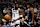 MINNEAPOLIS, MINNESOTA - JANUARY 11: Anthony Edwards #5 of the Minnesota Timberwolves celebrates his dunk as Jaylen Wells #0 of the Memphis Grizzlies looks on in the first quarter at Target Center on January 11, 2025 in Minneapolis, Minnesota. NOTE TO USER: User expressly acknowledges and agrees that, by downloading and or using this photograph, User is consenting to the terms and conditions of the Getty Images License Agreement. (Photo by David Berding/Getty Images)