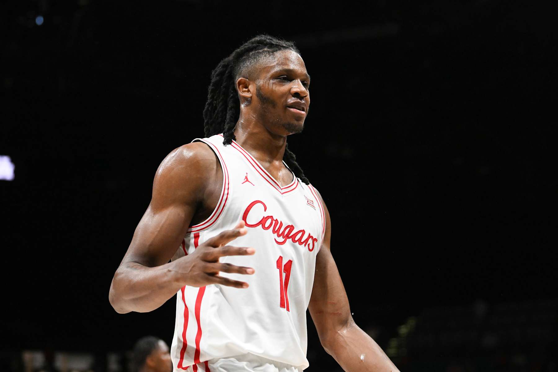 basketball basketball LAS VEGAS, NEVADA - NOVEMBER 26: Joseph Tugler #11 of the Houston Cougars reacts to a play against the Alabama Crimson Tide in the second half of their game during the Players Era Festival basketball tournament at MGM Grand Garden Arena on November 26, 2024 in Las Vegas, Nevada. The Crimson Tide defeated the Cougars 85-80 in overtime. (Photo by Candice Ward/Getty Images)