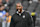 LAS VEGAS, NEVADA - JANUARY 05: Defensive coordinator Patrick Graham of the the Las Vegas Raiders walks the field during player warm ups before their game against the Los Angeles Chargers at Allegiant Stadium on January 05, 2025 in Las Vegas, Nevada. The Chargers defeated the Raiders 34-20. (Photo by Candice Ward/Getty Images)