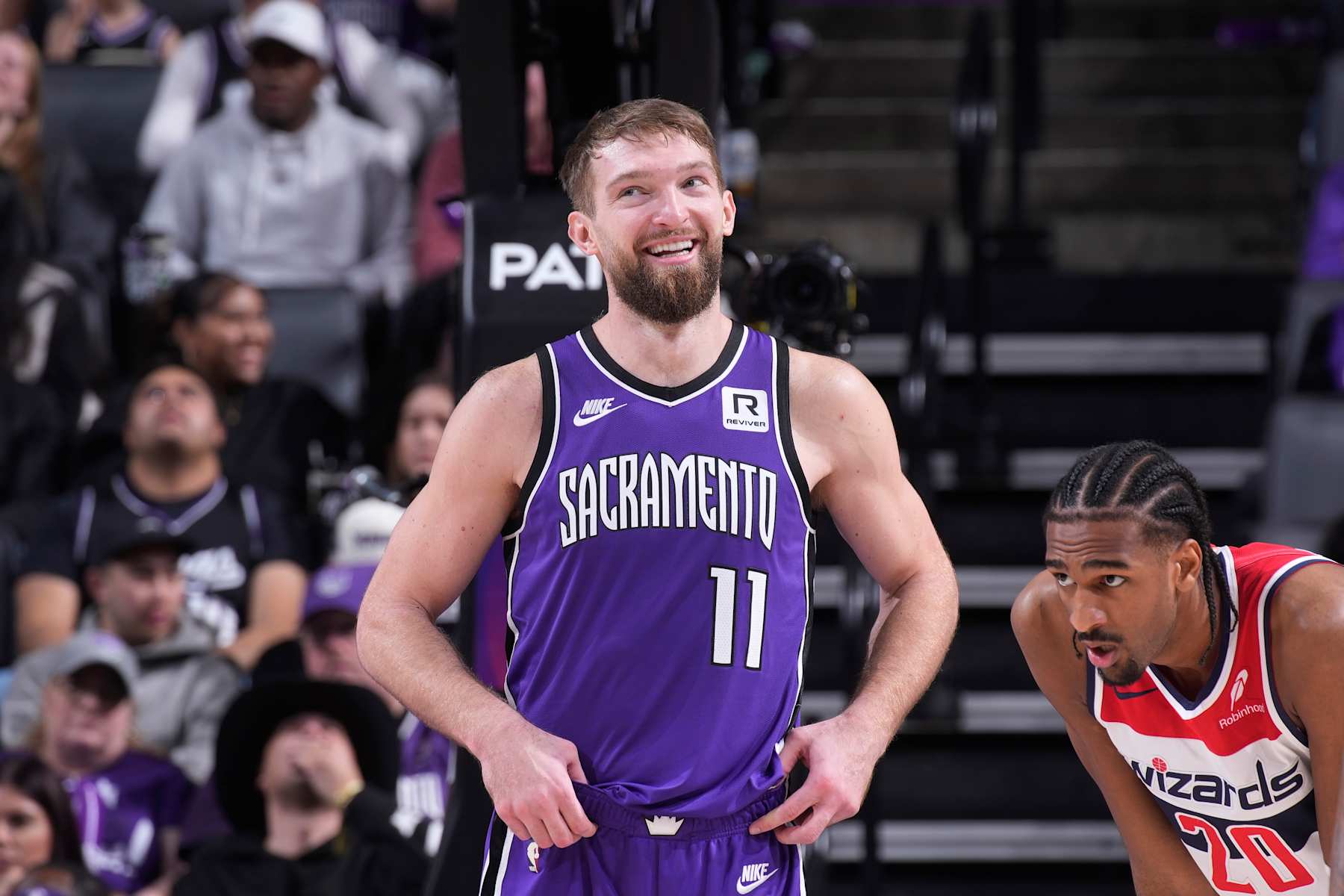 Sacramento, California - January 19: Sacramento Kings Domantas Sabonis #11 smiles during the game against Washington Wizards on January 19, 2025 at Golden 1 Center in Sacramento, California. Note to the User: The User explicitly confirms and agrees that by downloading or using this photo the User agrees to the terms of the Ghetto Image Agreement. Mandatory copyright notice: Copyright 2025 NBAE (photo from Rocky Widner/Nbae via Getty Images)